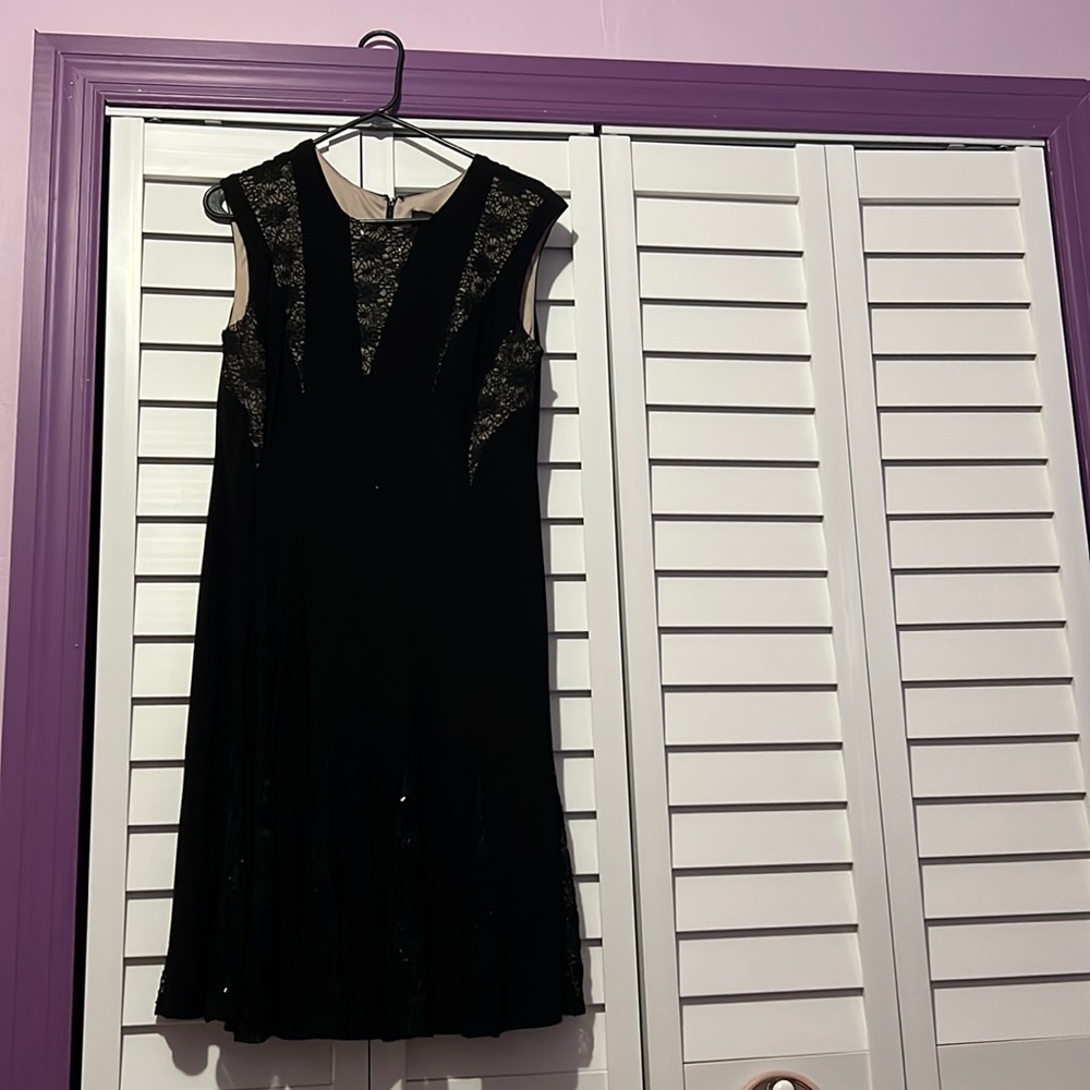 R&M Collection Size 10, The color of the dress is black with sparkles